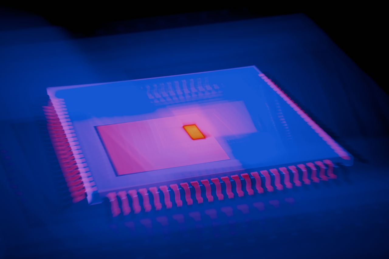 about-img Blurred abstract image of a microchip with heatmap colors highlighting technological innovation.